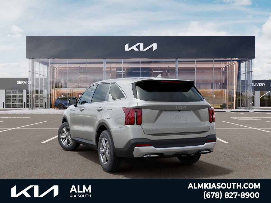 New 2026 Ivory Silver Kia LX image 4