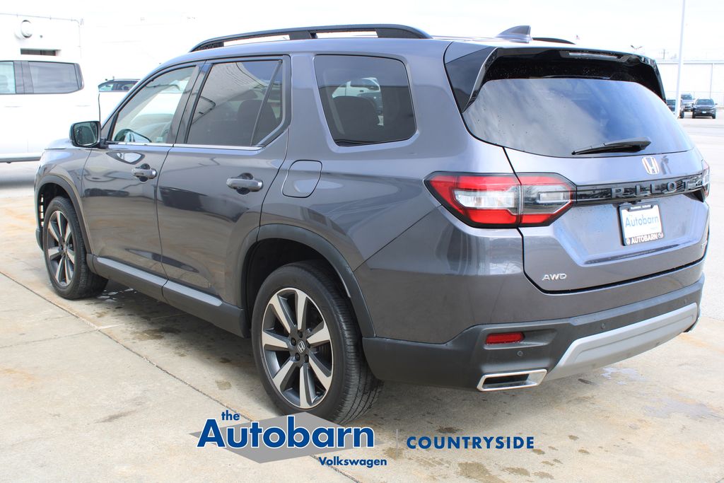 View vehicle photo 4