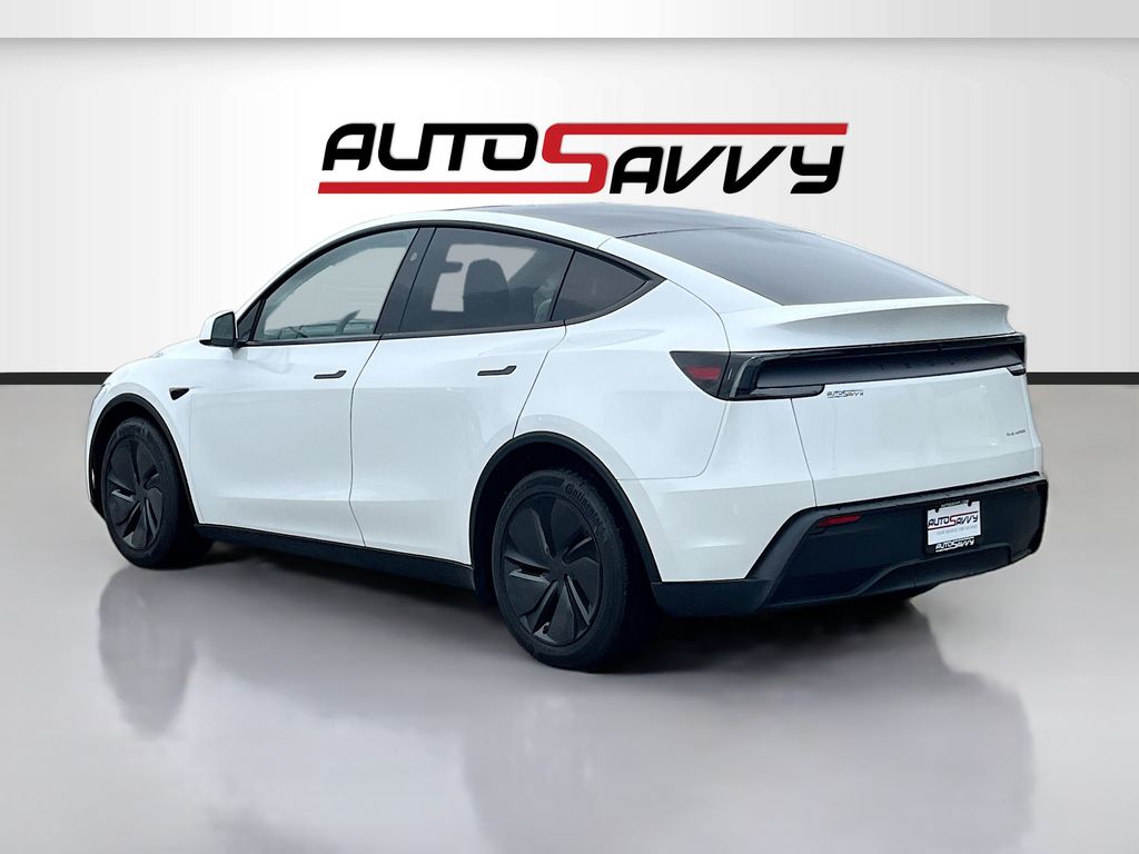 2026 Tesla Model Y Long Range White at AutoSavvy Houston Northwest