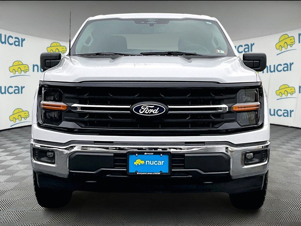 View vehicle photo 3