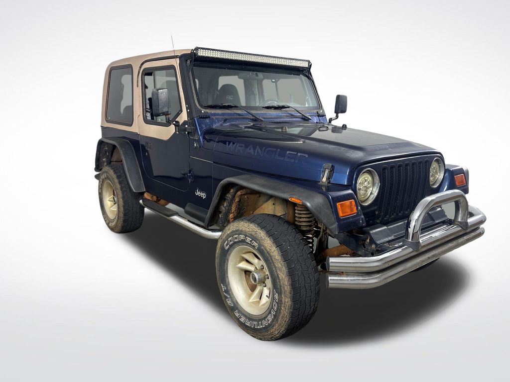 Patriot Blue Pearlcoat/Dark Tan Soft Top 2000 Jeep Wrangler SE SUV / Crossover Four-Wheel Drive 5-Speed Manual