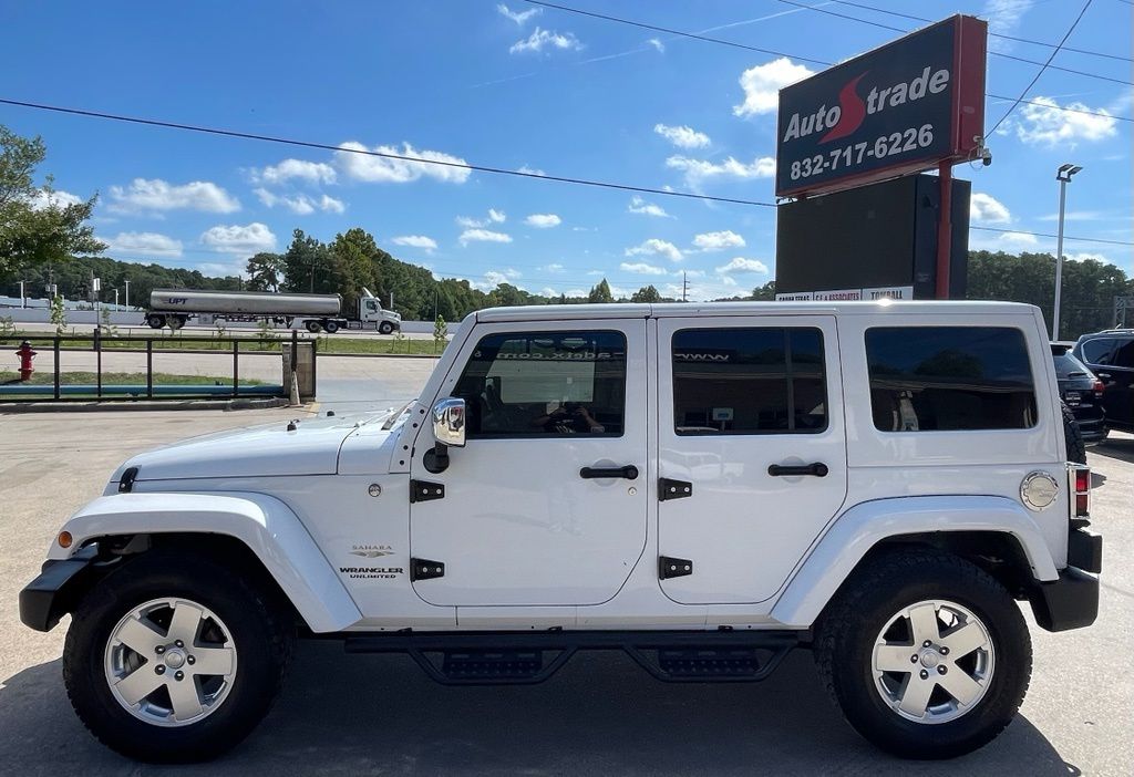 2011 Jeep Wrangler Unlimited Sahara White at Emmons Autoplex