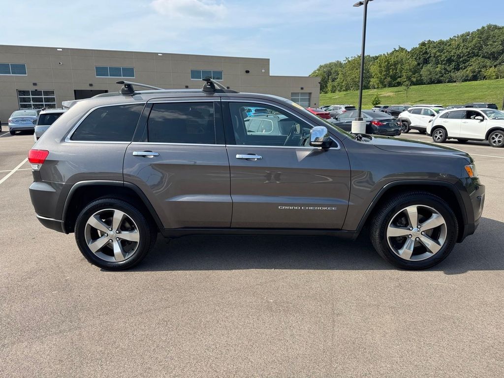 Used 2015 Granite Crystal Metallic Clearcoat Jeep Limited image 2