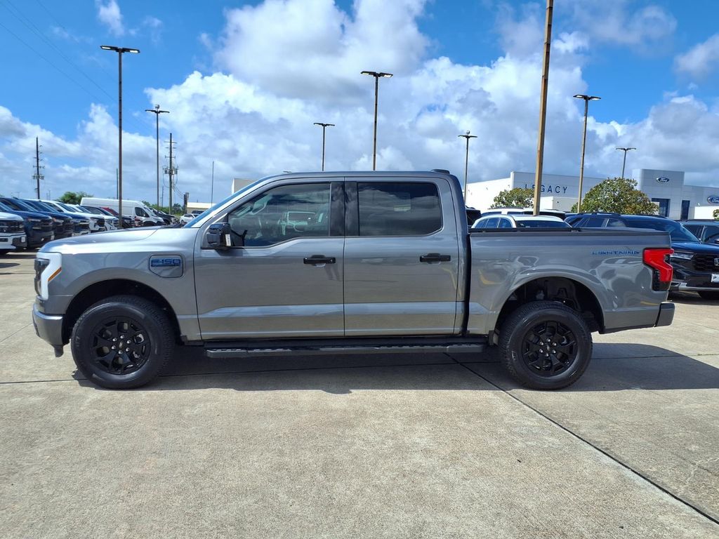 2025 Ford F-150 Lightning XLT Gray at DeMontrond Ford