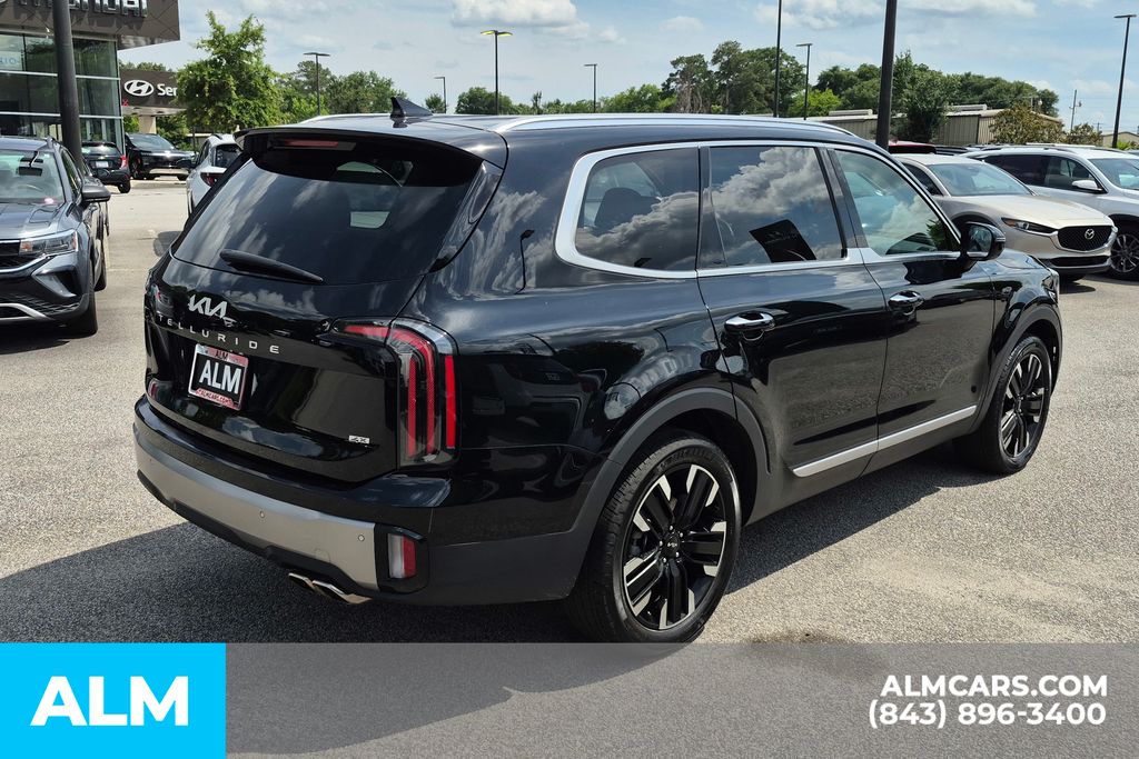 Used 2025 Ebony Black Kia SX-Prestige image 5