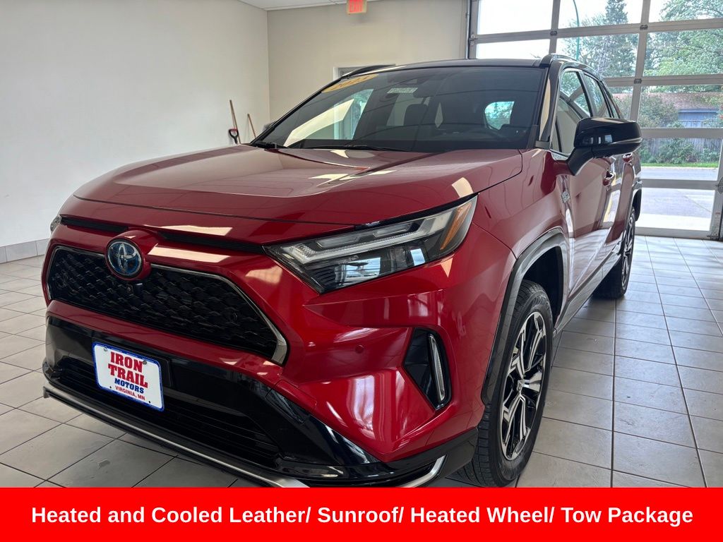 Supersonic Red/Midnight Black Metallic 2023 Toyota RAV4 Prime SUV / Crossover All-Wheel Drive Continuously Variable Transmission