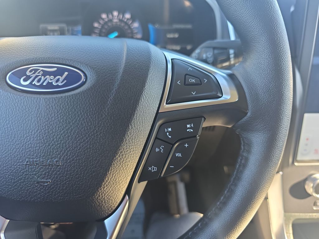 Certified Used 2024 Blue Ford Titanium image 26