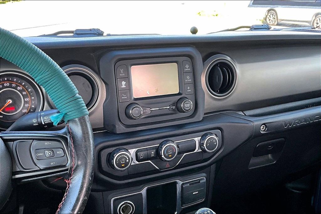 Used 2020 Teal Jeep Unlimited Sport image 6