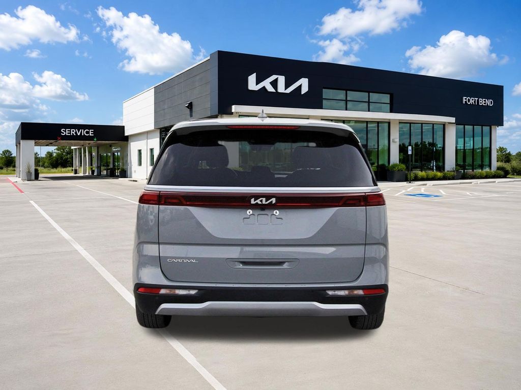 2024 Kia Carnival EX White at Classic Chevrolet Galveston