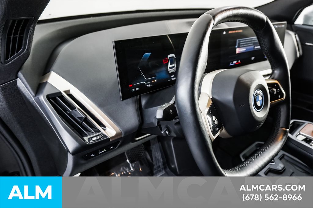 Used 2023 White BMW xDrive50 image 34