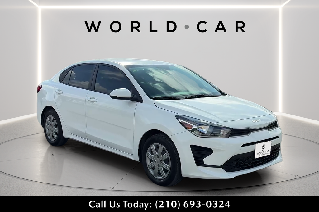 Clear White 2023 Kia Rio Sedan Front-Wheel Drive Continuously Variable Transmission
