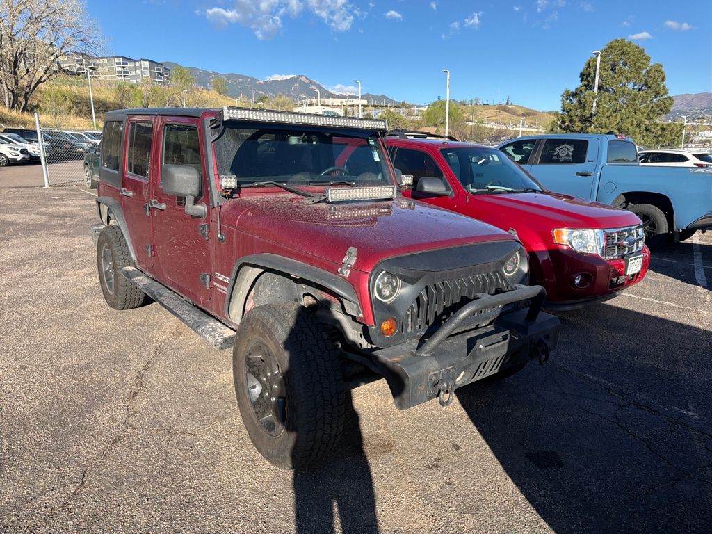 Deep Cherry Red Crystal Pearlcoat 2013 Jeep Wrangler Unlimited Sport 4WD SUV / Crossover Four-Wheel Drive 5-Speed Automatic