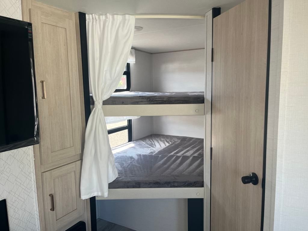 2025 White Prime Time Avenger 27DBS Travel Trailer