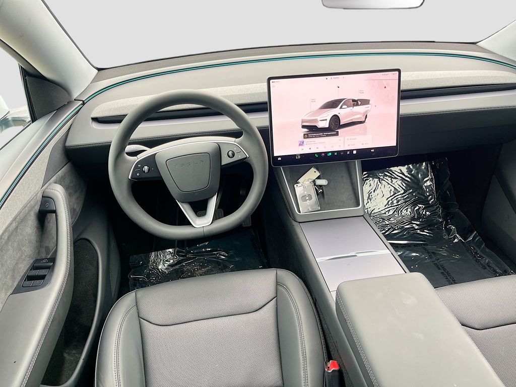 2026 Tesla Model Y Long Range White at AutoSavvy Houston Northwest