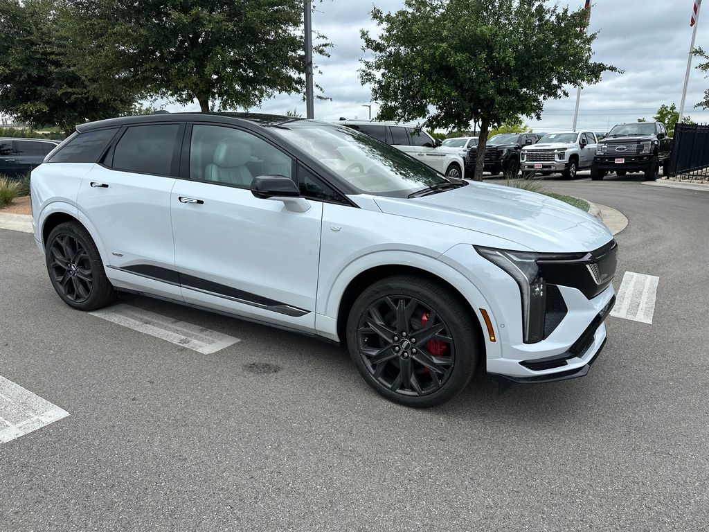 Vibrant White 2026 Cadillac OPTIQ-V AWD SUV / Crossover All-Wheel Drive 1-Speed Automatic
