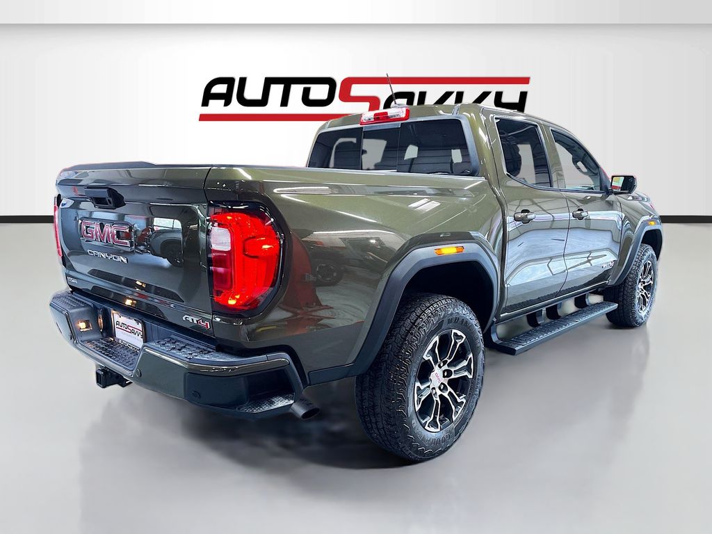 Used 2023 Deep Bronze Metallic GMC AT4 image 7