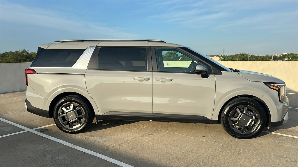 2026 Kia Carnival Hybrid EX White at Shottenkirk Kia Fort Bend