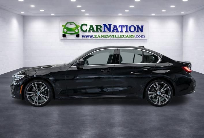 2021 BMW 3 Series 330i xDrive - Image 4