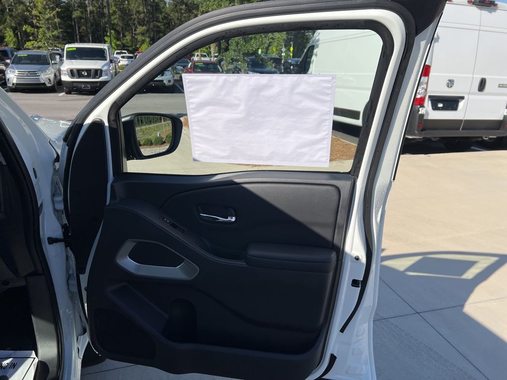 2025 Glacier White Nissan Frontier SV RWD Truck