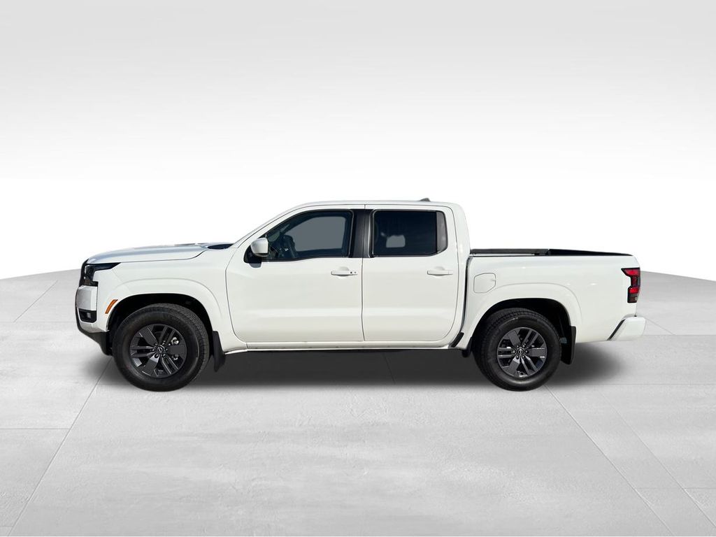 2025 Glacier White Nissan Frontier SV RWD Truck