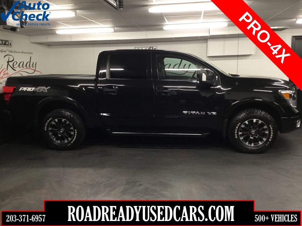 Gray (Magnetic Black Metallic) 2019 Nissan Titan Pickup Truck Four-Wheel Drive 7-Speed Automatic