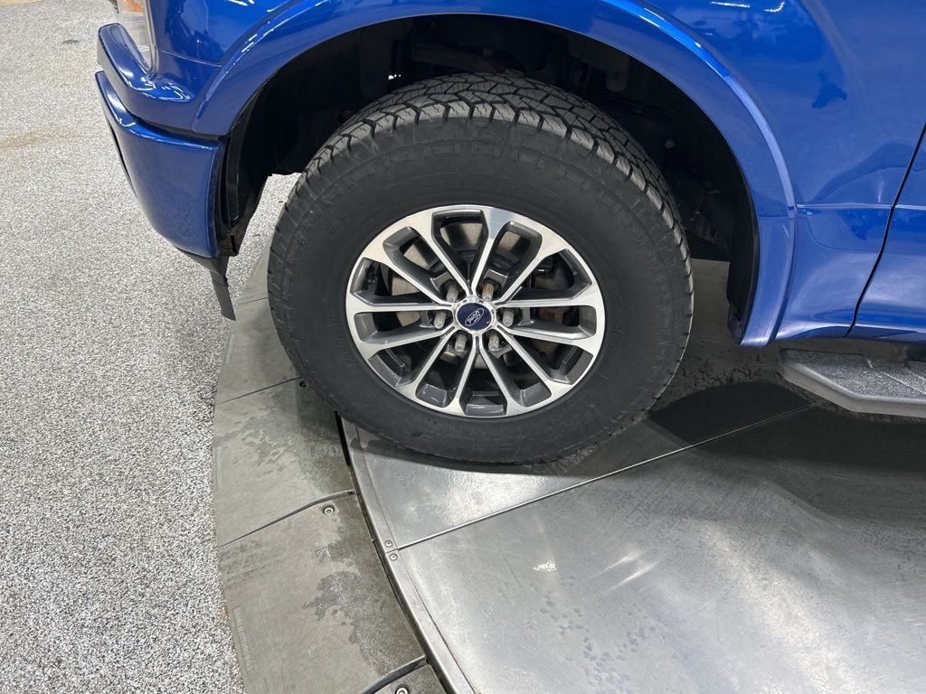 used 2018 Ford F-150 car, priced at $19,056