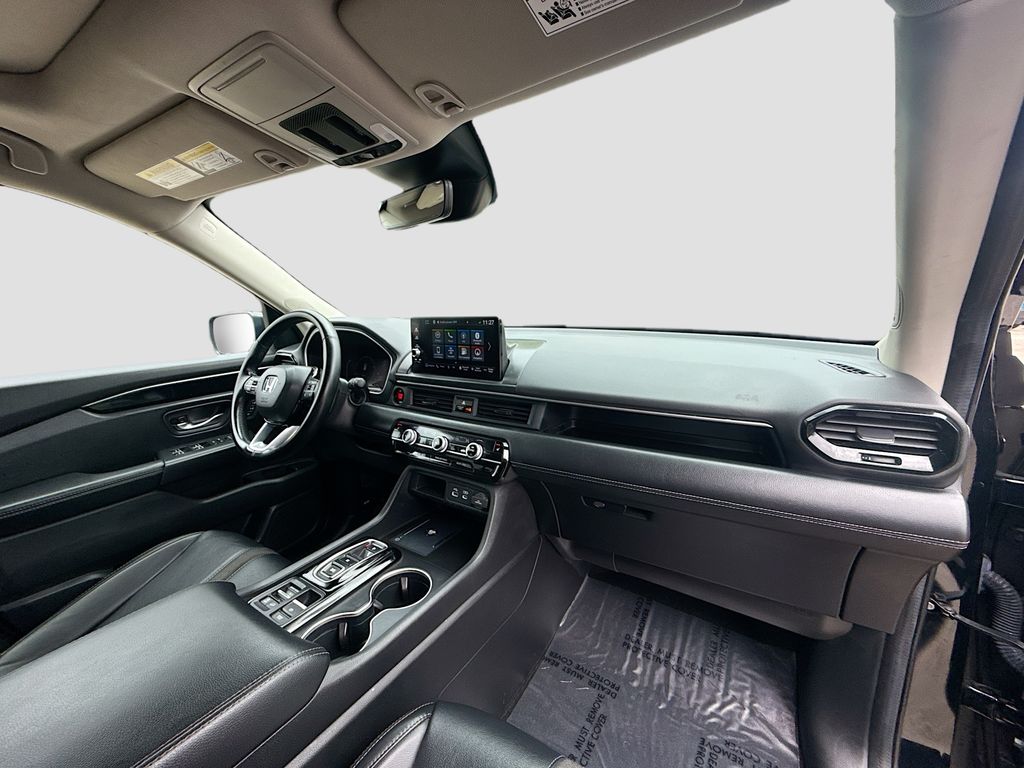 2024 Honda Pilot Touring Black at AutoSavvy Houston Northwest