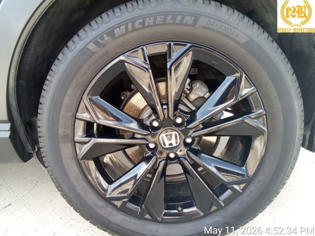 View vehicle photo 3