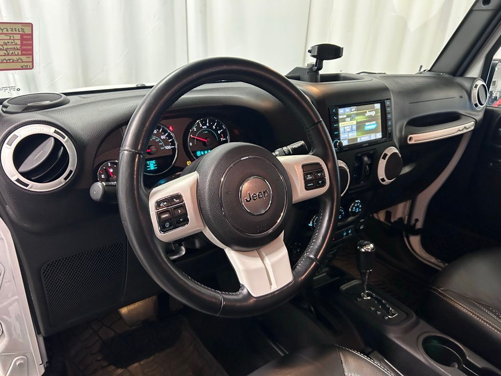 used 2015 Jeep Wrangler car, priced at $16,299