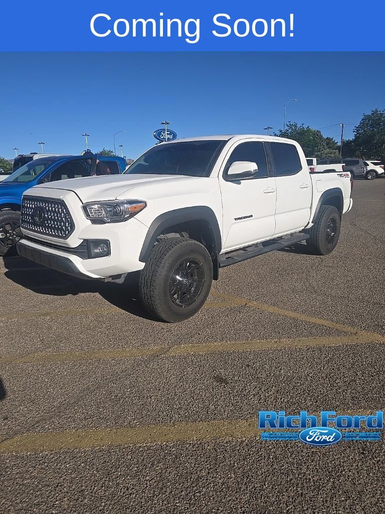Super White 2019 Toyota Tacoma Pickup Truck Four-Wheel Drive 6-Speed Manual