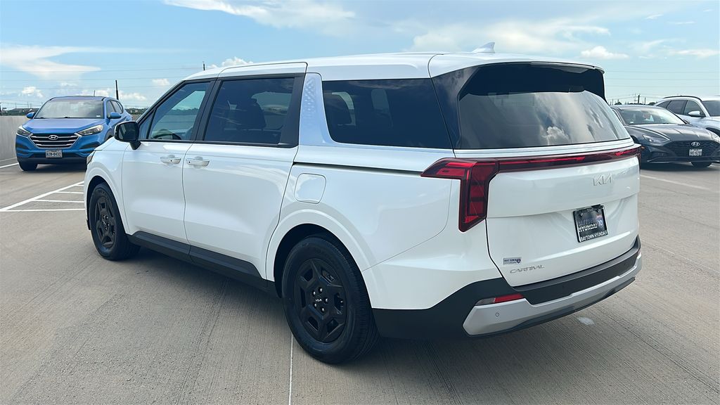 2026 Kia Carnival LXS White at DeMontrond Automotive Group