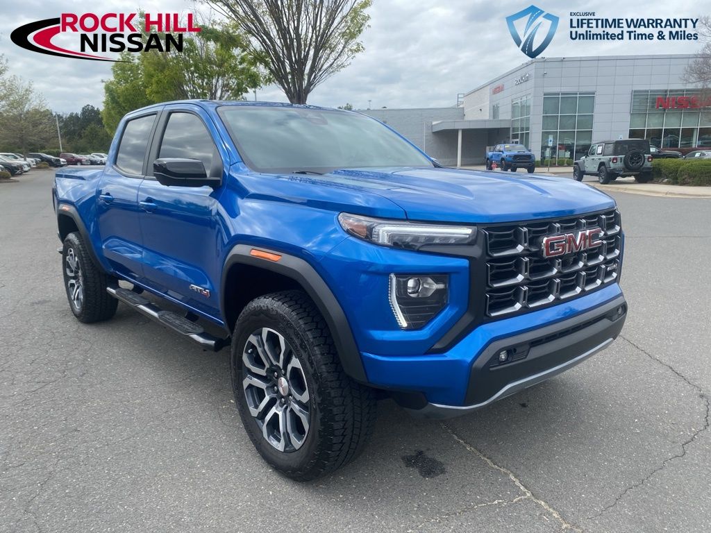 Dynamic Blue Metallic 2024 GMC Canyon AT4 Crew Cab 4WD Pickup Truck Four-Wheel Drive 8-Speed Automatic