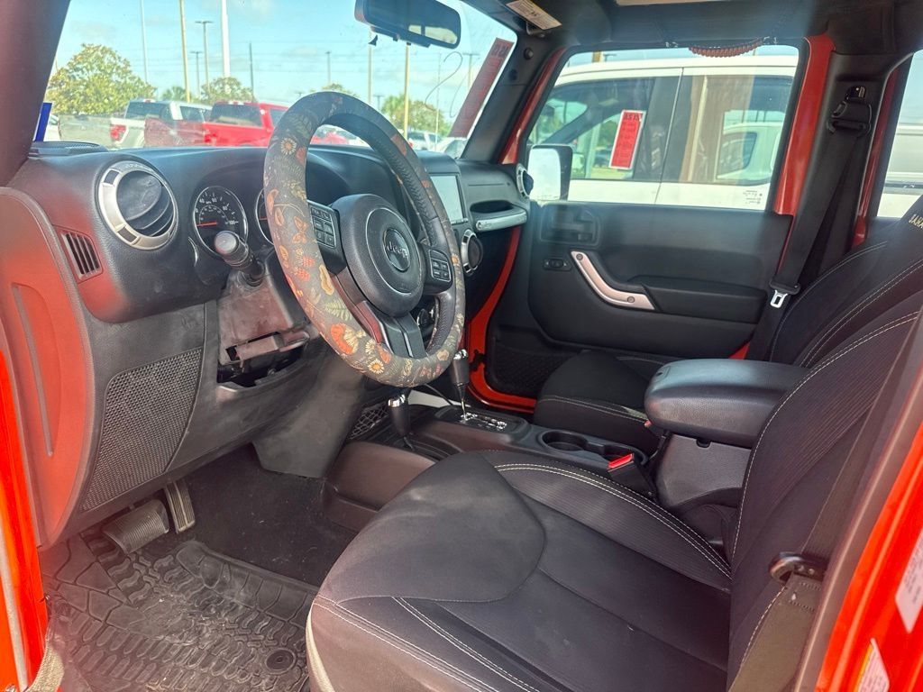 2015 Jeep Wrangler Unlimited Sahara Orange at Emmons Autoplex