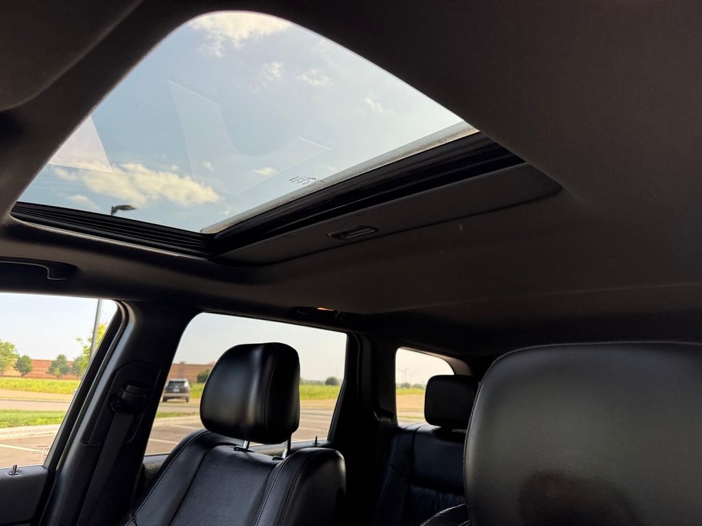 Used 2015 Granite Crystal Metallic Clearcoat Jeep Limited image 7