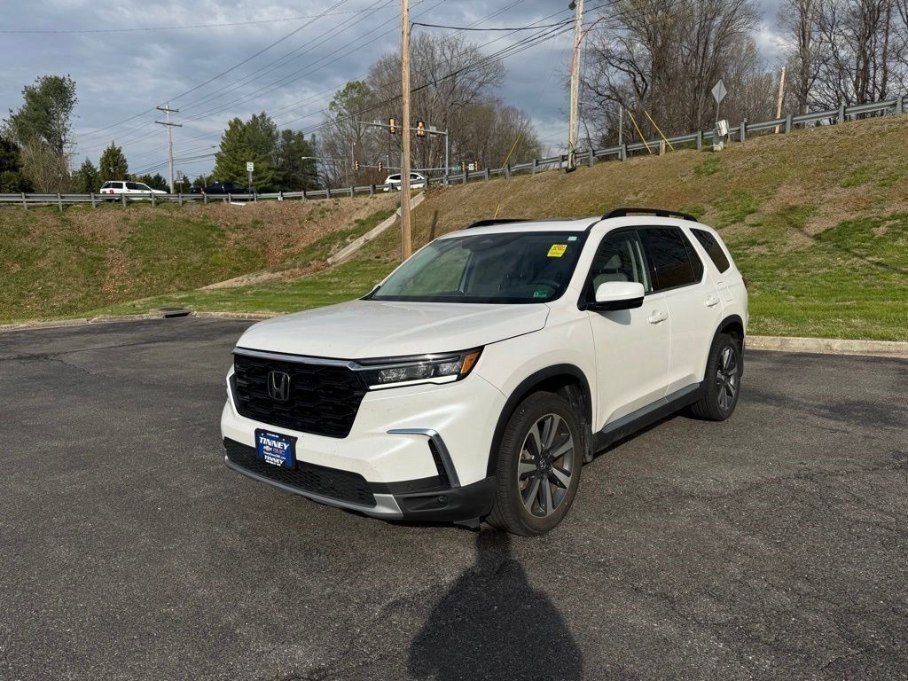 View vehicle photo 3