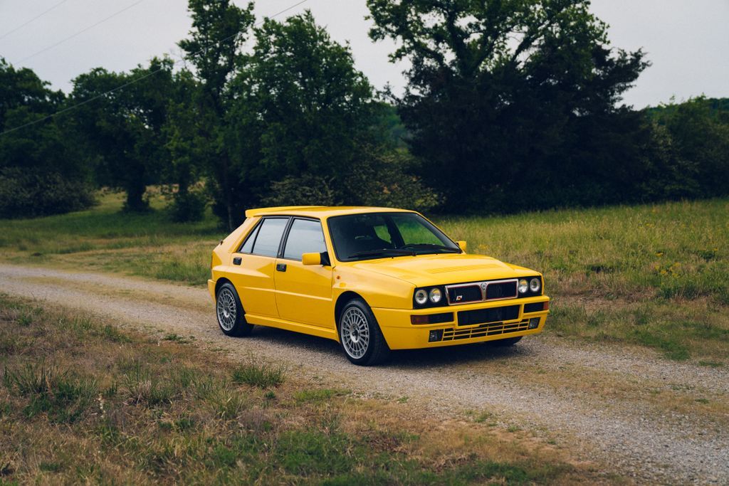 Yellow 1994 Lancia Delta Hatchback 5-Speed Manual