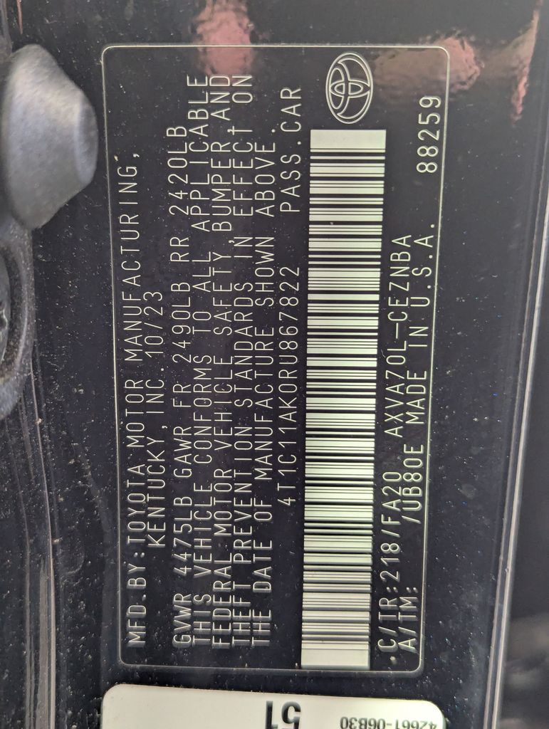 2024 Midnight Black Metallic Toyota Camry LE FWD Sedan