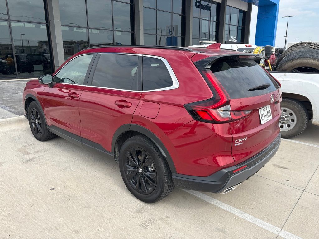 2025 Radiant Red Metallic Honda CR-V Hybrid Sport Touring AWD SUV