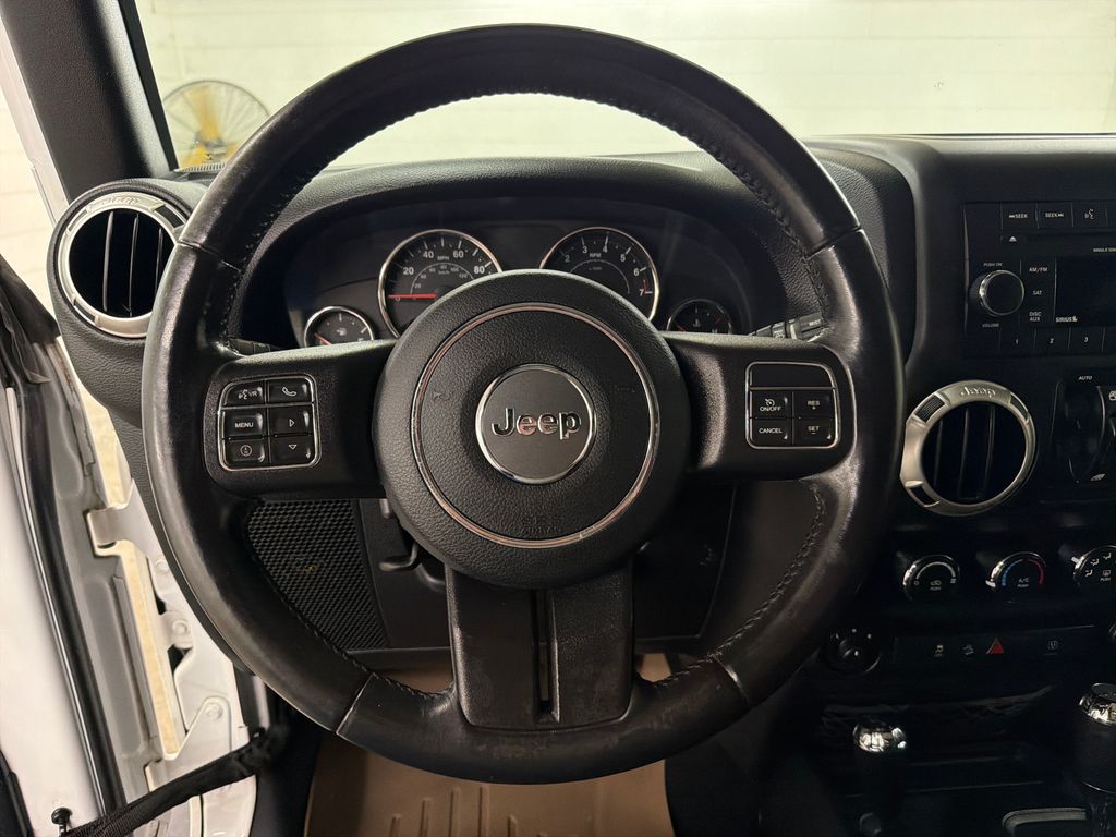 Used 2018 White Jeep Unlimited Sahara image 17