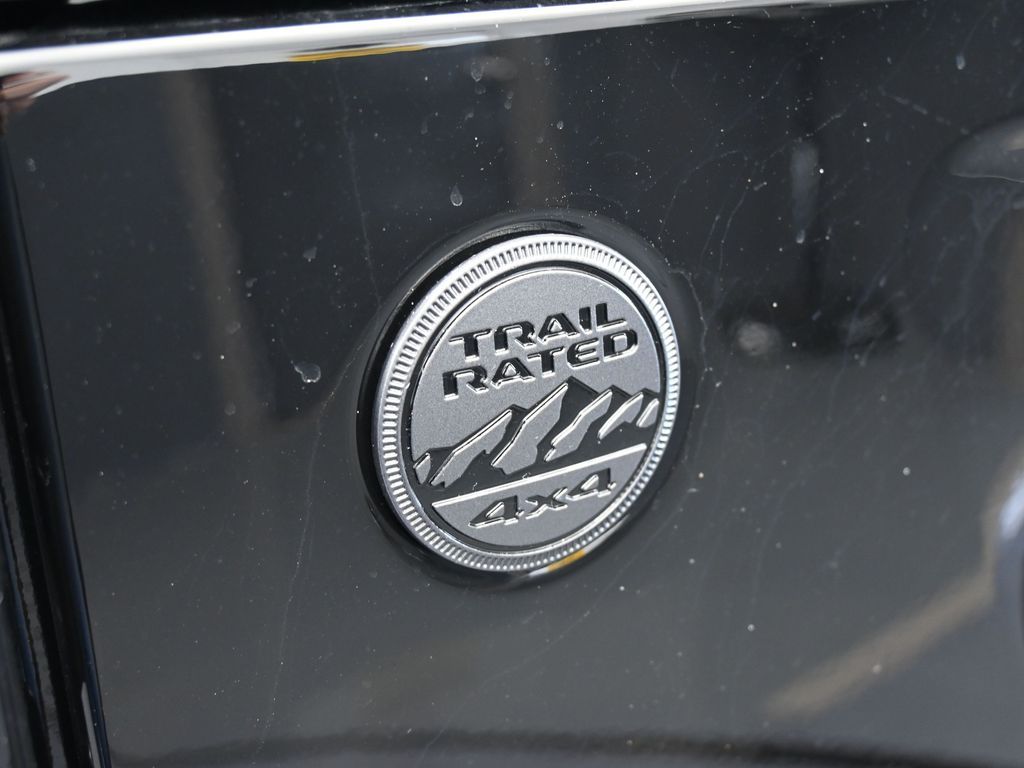 New 2026 black clearcoat Jeep Sport image 40