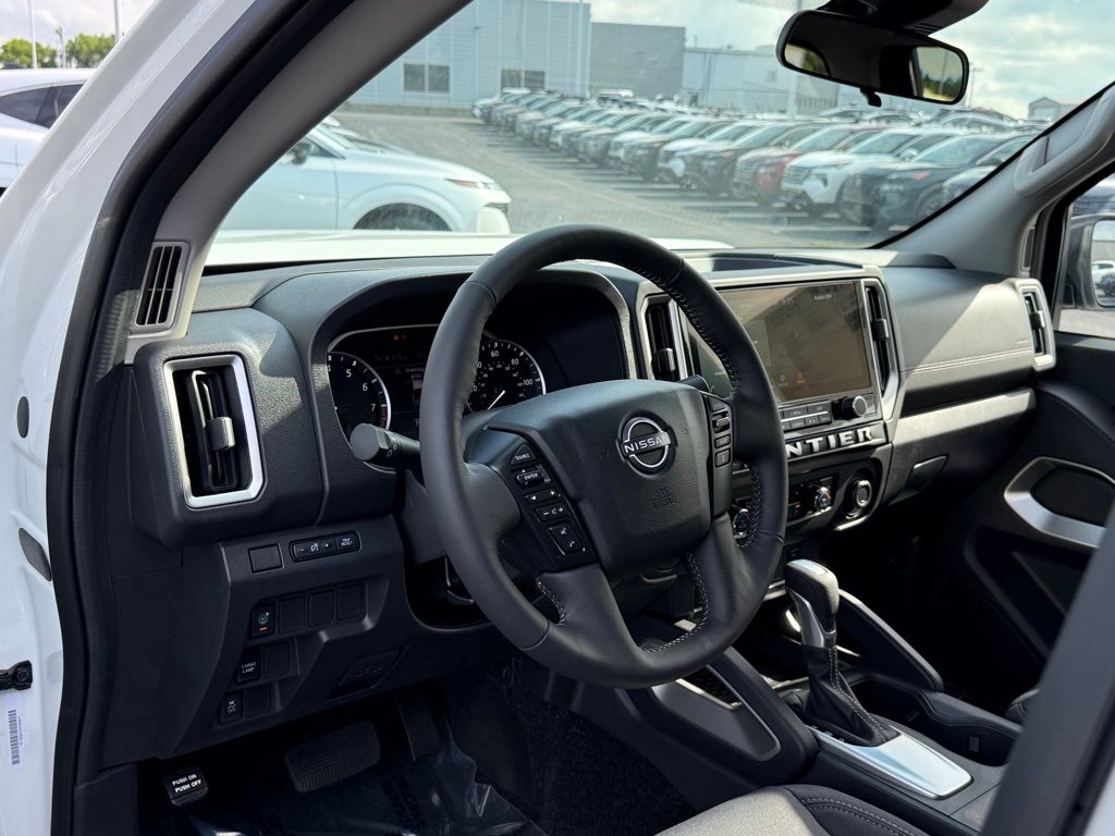 View vehicle photo 3