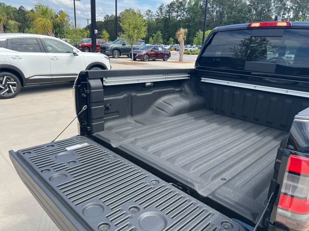 2025 Super Black Nissan Frontier SV RWD Truck