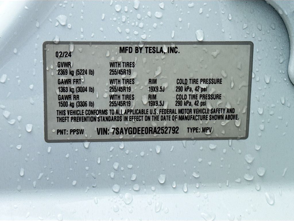 2024 Tesla Model Y Long Range White at AutoSavvy Houston Southwest