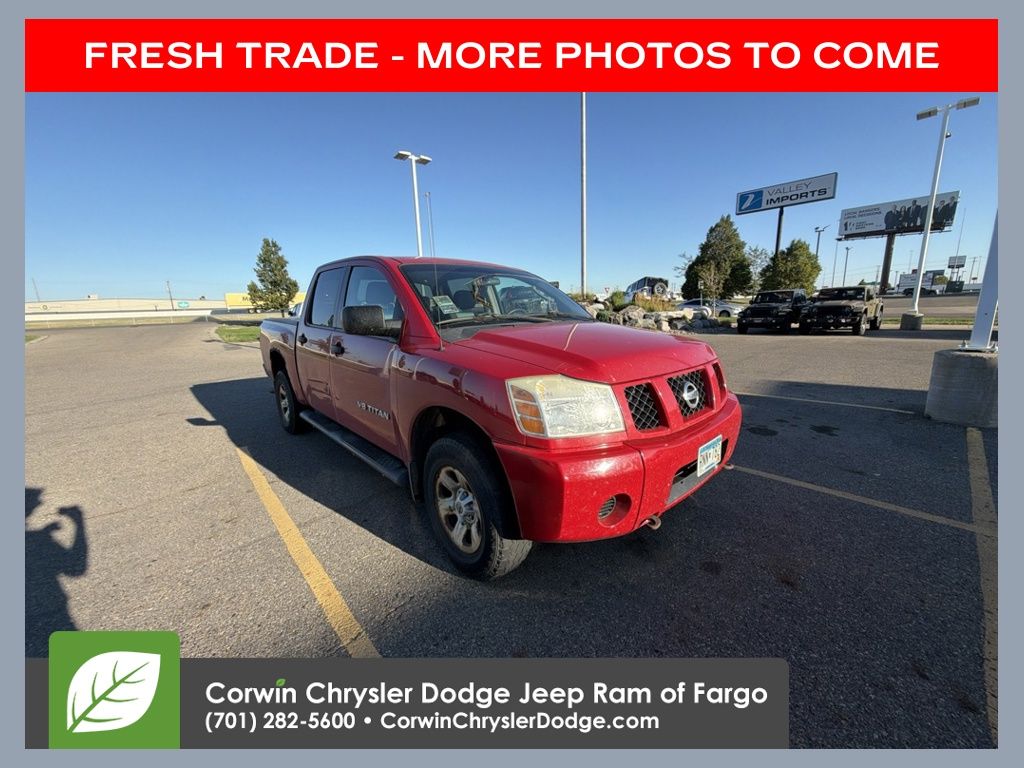 Red 2005 Nissan Titan Pickup Truck Four-Wheel Drive 5-Speed Automatic