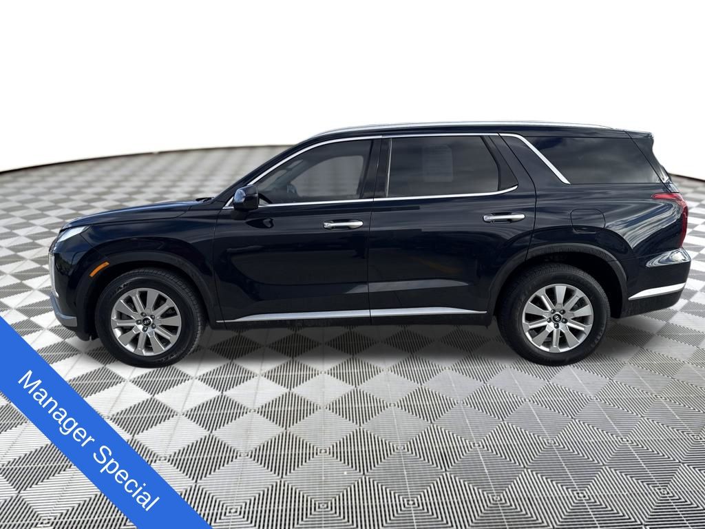 View vehicle photo 3