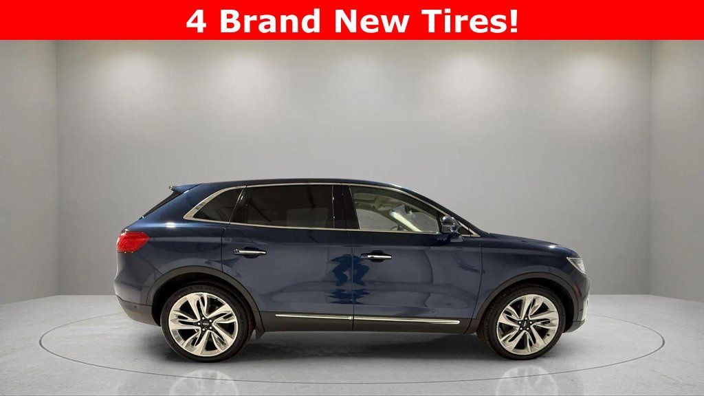 Used 2017 Midnight Sapphire Blue Metallic Lincoln Reserve image 2