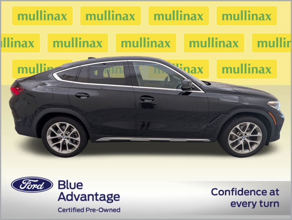 Certified Used 2023 Black BMW xDrive40i image 2