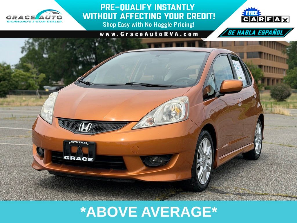 Orange Revolution Metallic 2010 Honda Fit Sport Hatchback Front-Wheel Drive 5-Speed Automatic