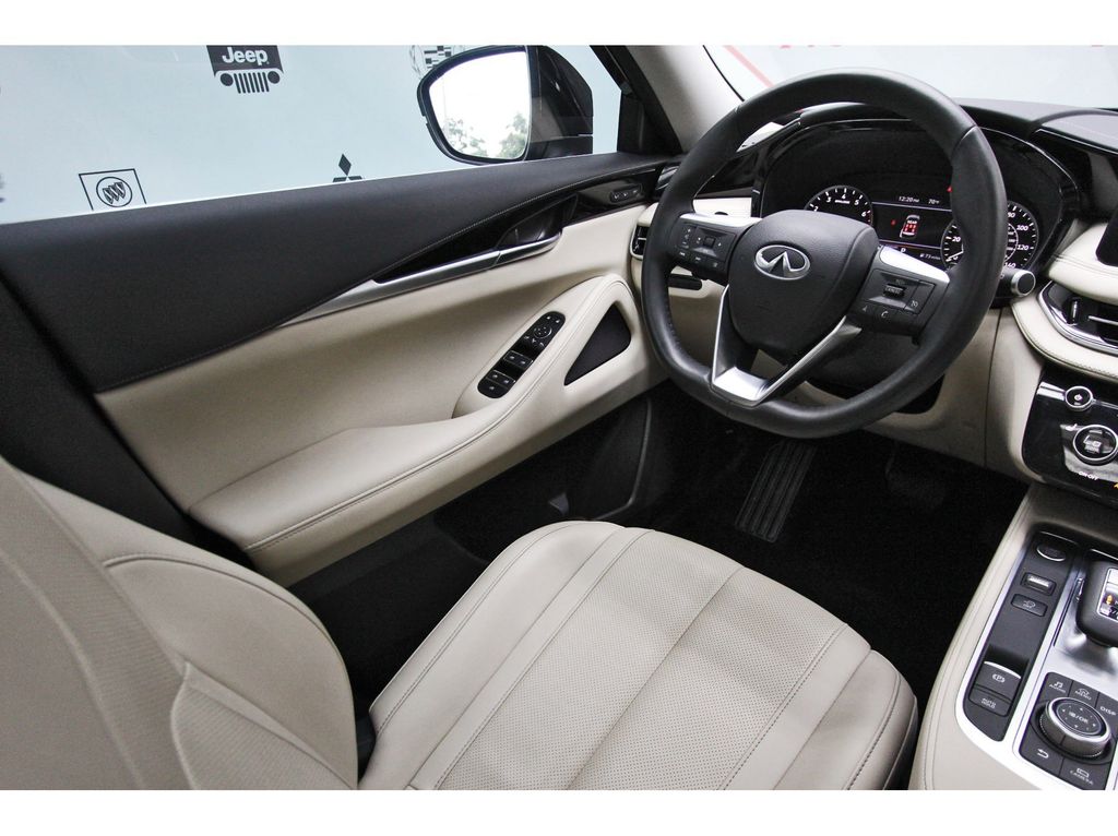 2025 INFINITI QX60 PURE Black at Central Houston Nissan