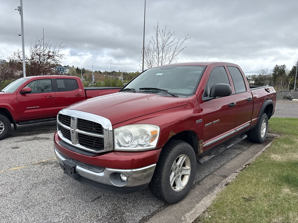 Red 2007 Dodge RAM 1500 ST Quad Cab 4WD Pickup Truck Four-Wheel Drive 5-Speed Automatic